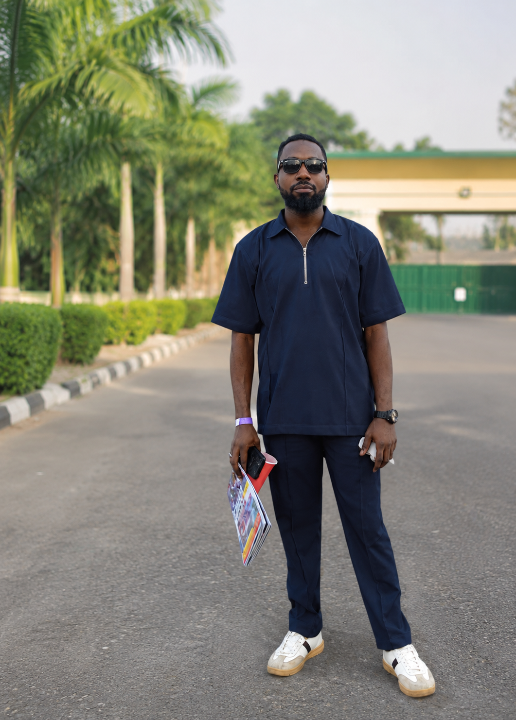 Busari Sodiq standing outdoors
